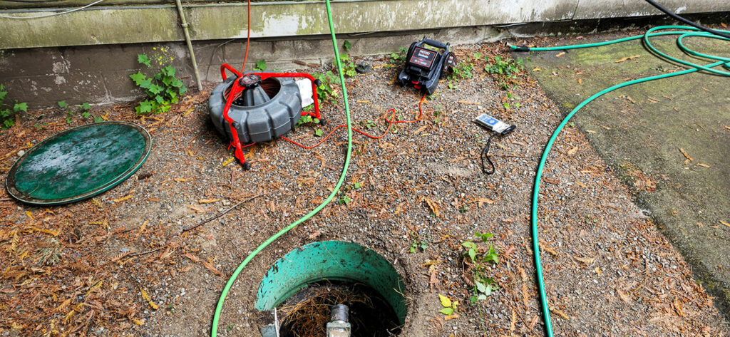 Sewer clearing tools, including a camera reel and monitor