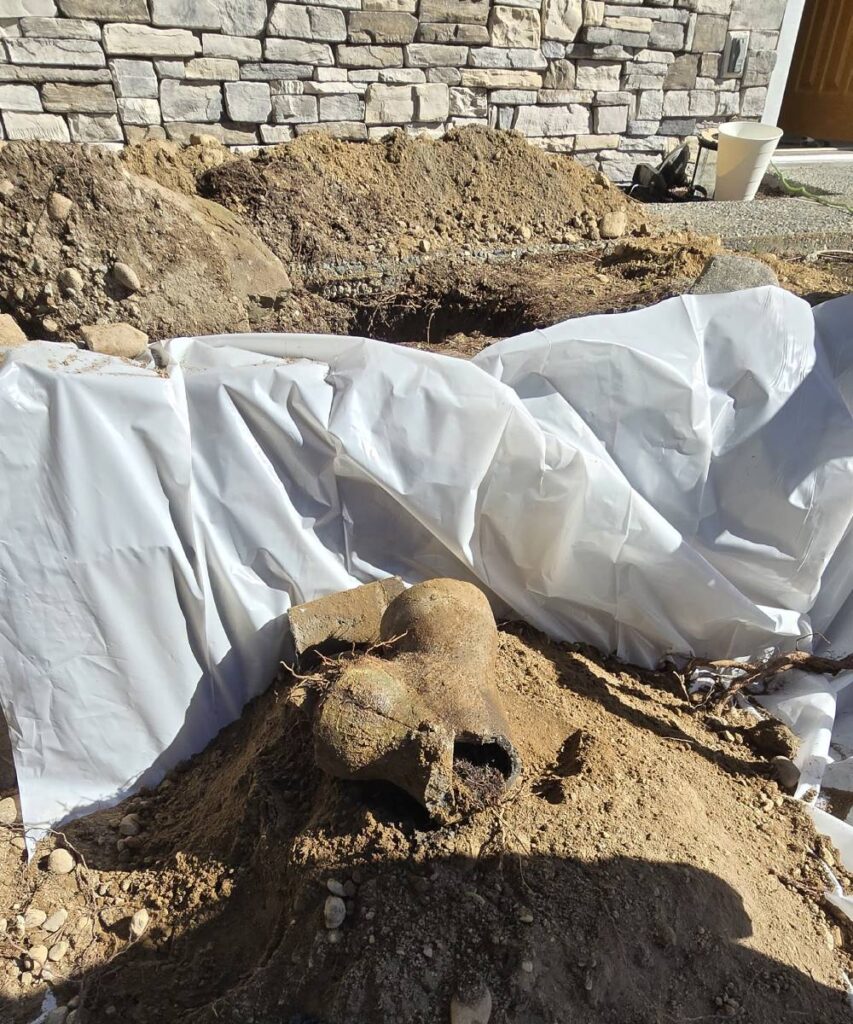 Trenchless pipe bursting in Seattle backyard
