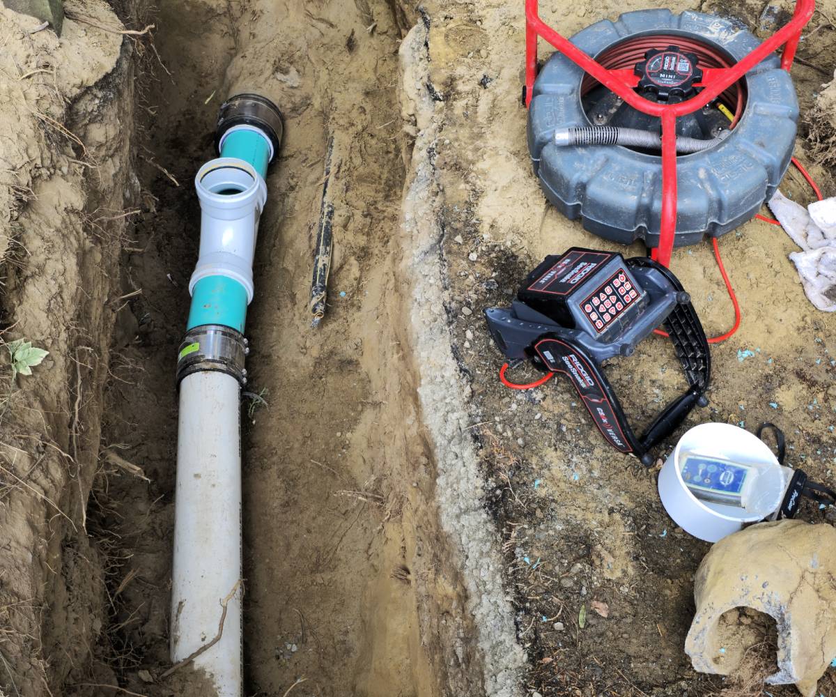 High-resolution camera inspecting a clogged sewer line in a residential Seattle property.