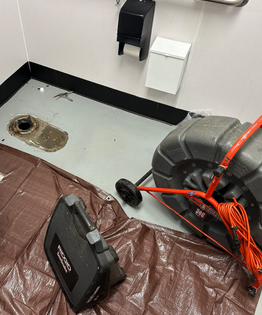 A KnightRooter technician performing a Seattle camera inspection 